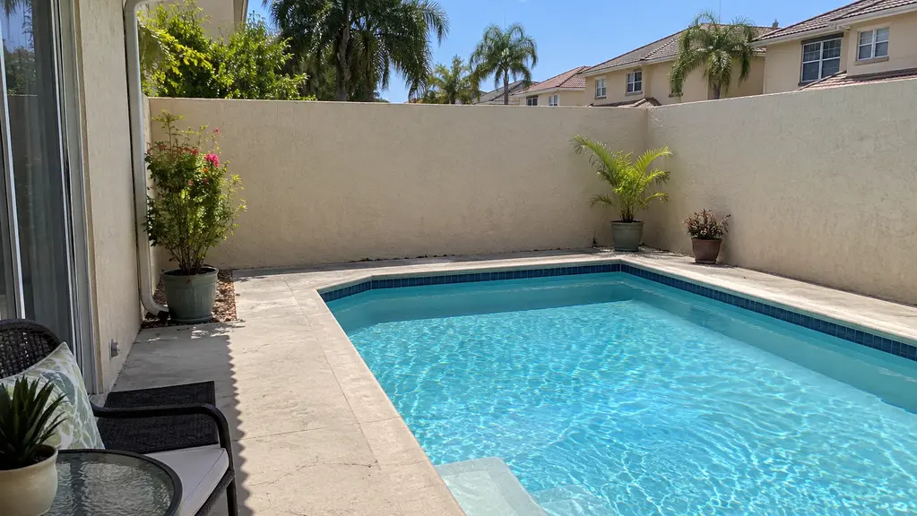 A clean courtyard pool at a townhome