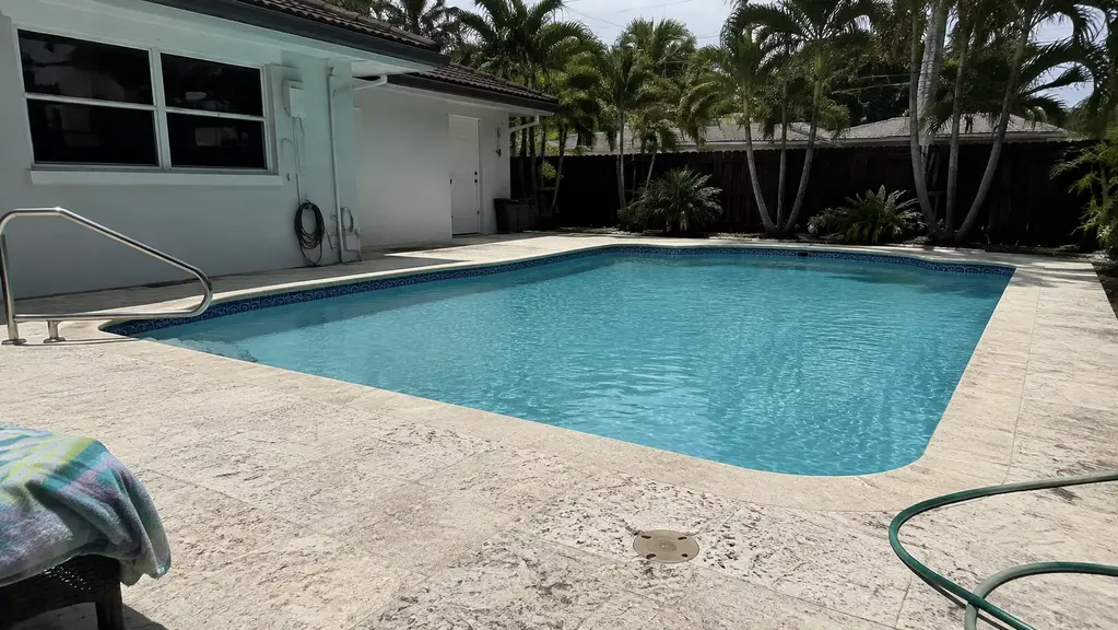 A clean rectangular backyard pool
