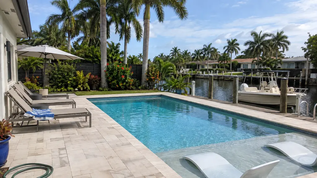 A backyard swimming pool at a home in Fort Lauderdale, FL