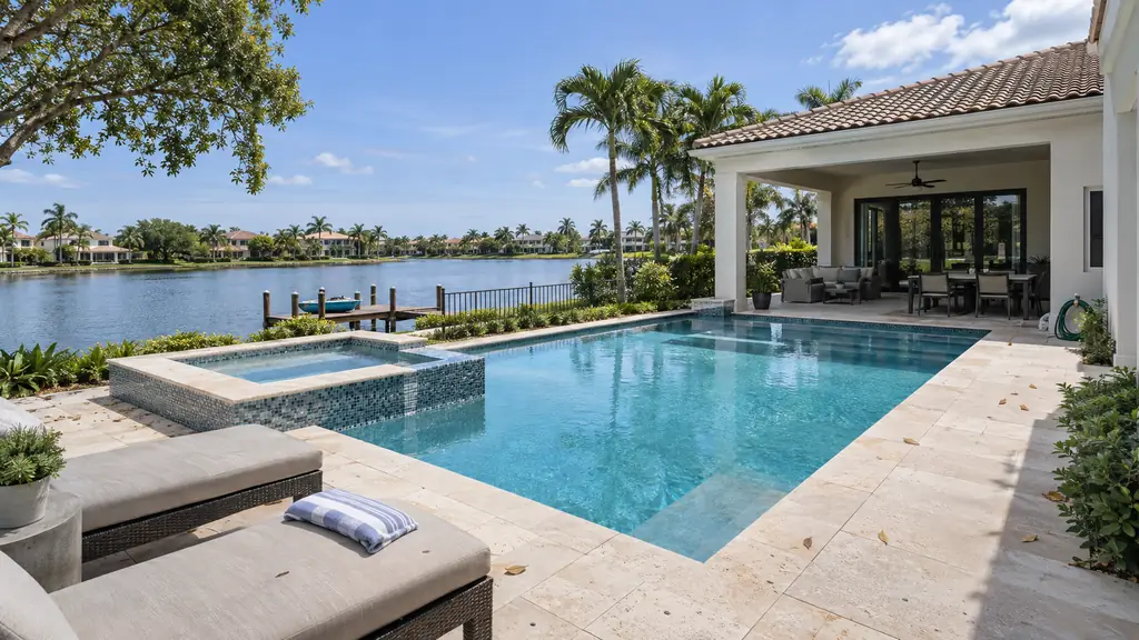 A backyard swimming pool at a home in Pembroke Pines, FL